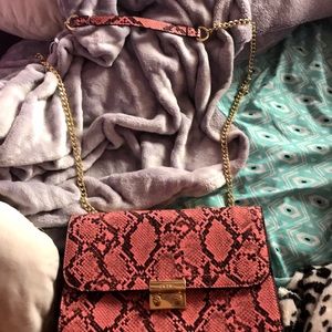 crossover snakeskin purse .